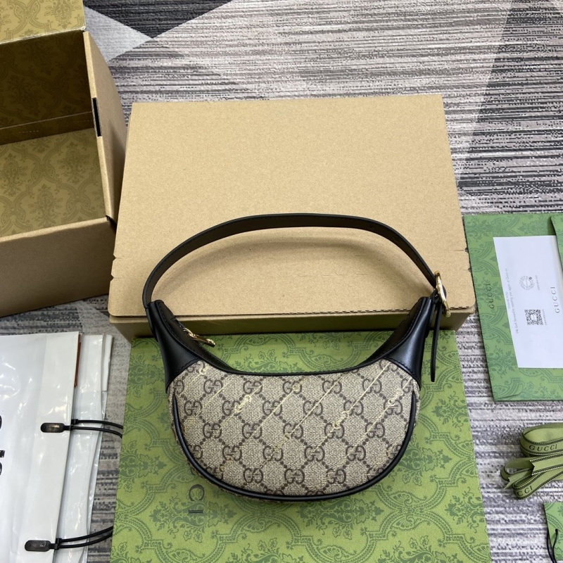 G*u*i top handle bags